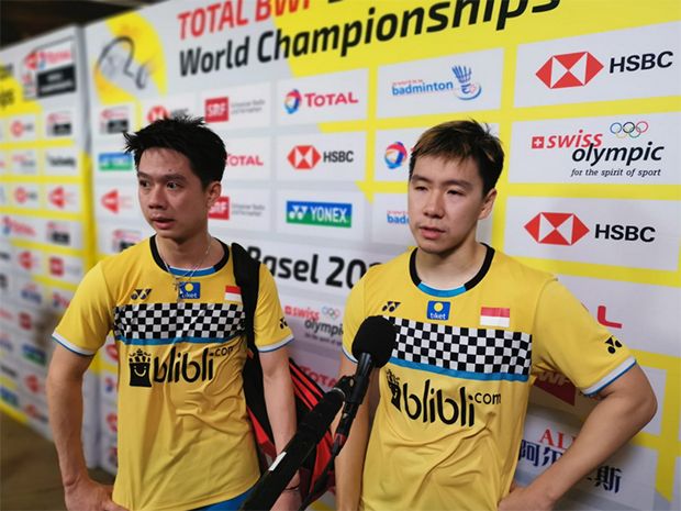 Ganda putra Indonesia, Marcus Gideon (kanan) dan Kevin Sanjaya, disebut gagal di Korea Open 2019 karena 'kutukan'/Foto: badmintonplanet.com