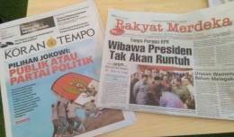 Koran Tempo dan koran Rakyat merdeka menyajika isu Perpu KPK dengan sudut pandang yang berbeda
