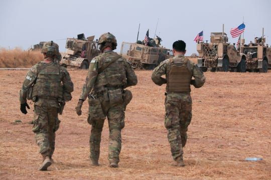 American military convoy stops near the town of Tel Tamr, north Syria, Sunday. (Photo: Baderkhan Ahmad, AP)