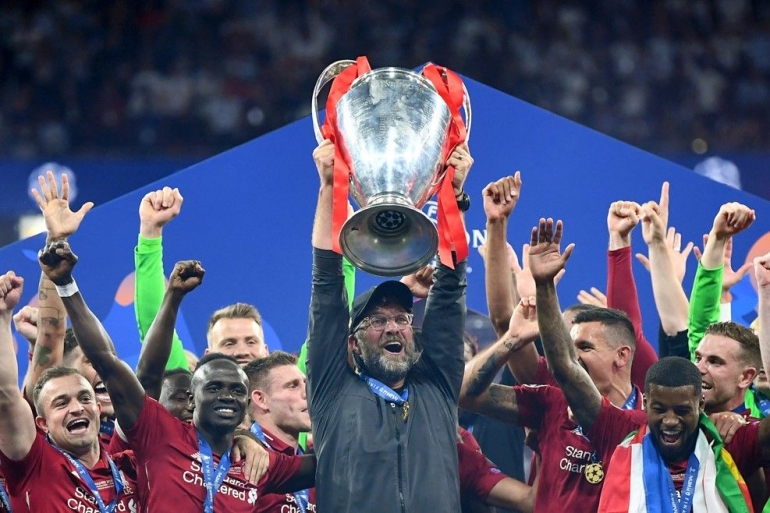 Jurgen Klopp dan Trofi Liga Champions 2019 (Foto Getty Images) 