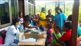 Foto : Kegiatan Posyandu tenaga Nusantara sehat puskesmas Urbinasopen distrik Waigeo timur Kab. Raja Ampat Papua Barat (dokpri).