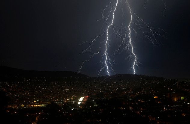 Bolts of lightning are shown striking south of San Francisco, Monday, Sept. 11, 2017. (AP Photo/Jeff Chiu)