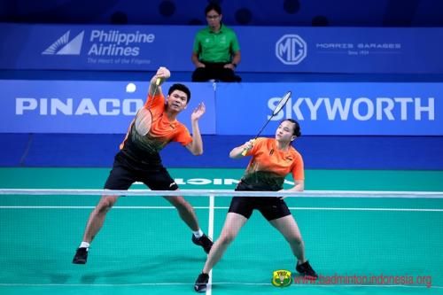 Praveen dan Melati sumbangkan emas di cabor badminton ganda campuran. (Okezone.com)