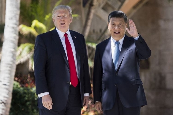 Presiden Amerika Serikat Donald Trump dan Presiden China Xi Jinping| Sumber: Jim Watson/AFP/Getty Images