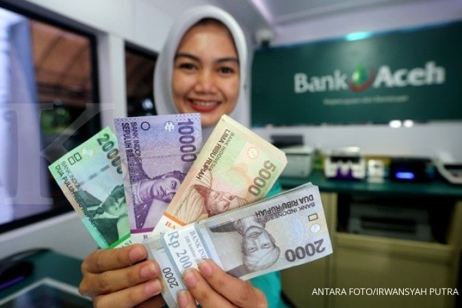 Qanun Aceh Nomor 11 tahun 2018 mengatur bahwa seluruh lembaga keuangan yang beroperasi di Aceh harus menggunakan prinsip syariah.| Sumber: Antara Foto / Irwansyah Putra