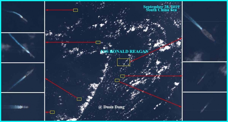 Foto satelit yang memperlihatkan USS Ronald Reagen tengah dikelilingi beberapa kapal Cina. Foto tersebut dipublikasikan di twitter oleh akun @DuanDang yang menurutnya berdasarkan citra yang diambil oleh satelit Sentinel-2 (twitter.com/ @DuanDang).