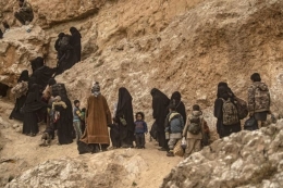 Perempuan dan anak-anak ISIS. Foto: KOMPAS.com/AFP