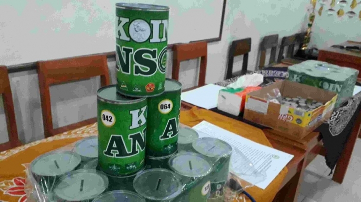 Kaleng bertulis Koin Ansor dok.pri