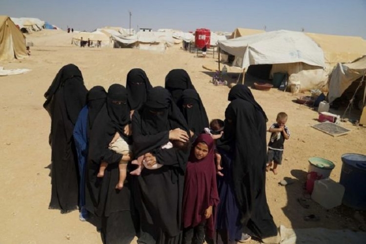 Ilustrasi: Wanita dan anak-anak asal Australia yang dahulu hidup di bawah kekuasaan kelompok teroris ISIS kini terlantar di kamp pengungsi al-Hawl di Suriah.(ABC NEWS / FOUR CORNERS)