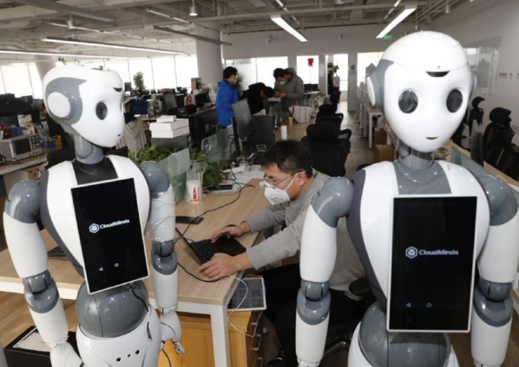 Robots that use cloud technology to help medical workers treat patients with the coronavirus are tested by a developer in a lab in Beijing this month. The smart devices are being used in hospitals in Beijing, Shanghai and Wuhan, Hubei province. China Daily/Asia News Network