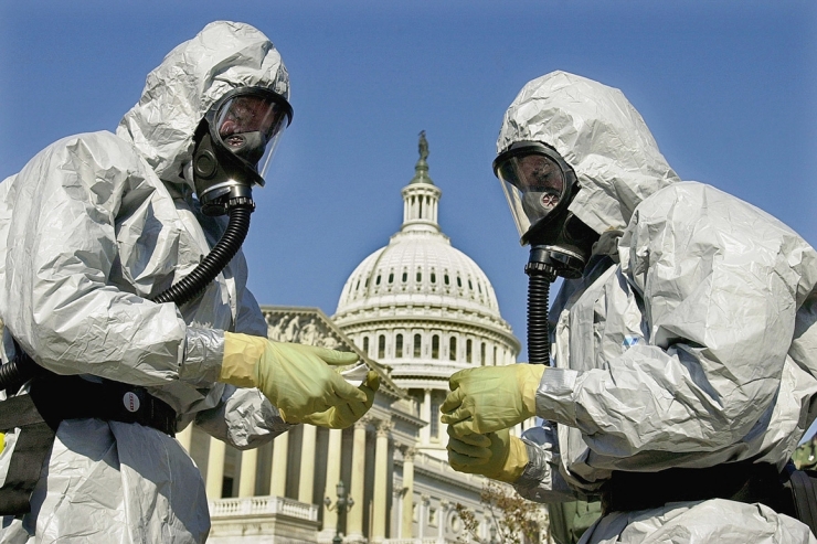 In this file photo, members of the U.S. Marine Corps' Chemical-Biological Incident Response Force demonstrate clean-up techniques for anthrax, a potential biological weapon. | Kenneth Lambert, File/AP Photo