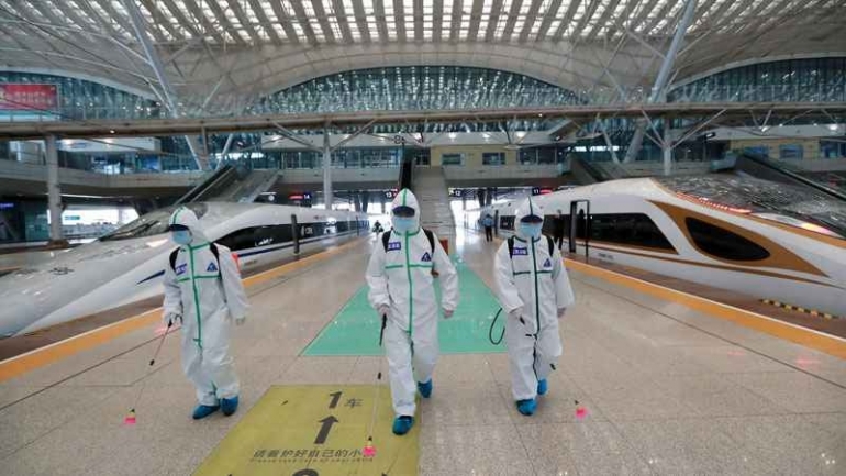 Photo: Zhao Jun/Xinhua via AP. In this photo released by Xinhua News Agency, firefighters conduct disinfection on the platform of Wuhan Railway Station in Wuhan, central China's Hubei Province, March 24, 2020.