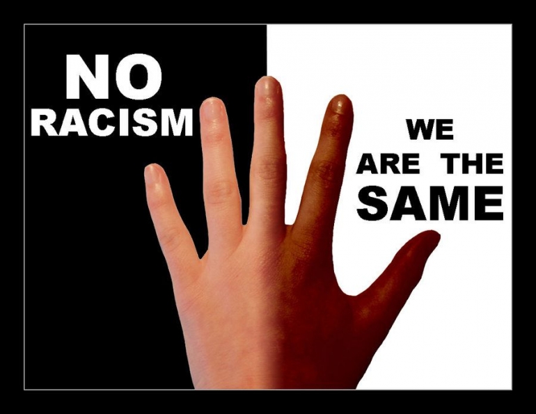 Say no to racism (Gambar: www.amuserr.com)