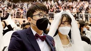 Ilustrasi pernikahan di tengah pandemi korona di Korea Selatan. Sumber foto: Al Jazeera. com