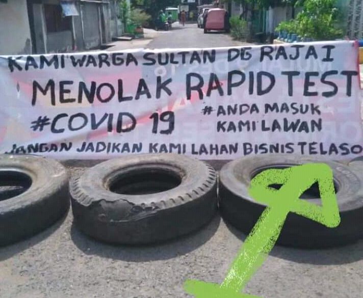 Spanduk penolakan pelaksanaan rapd tes milik warga Jalan Sultan Daeng Raja Kelurahan Malimongan Baru Kecamatan Bontoala,Kota Makassar (dokpri)