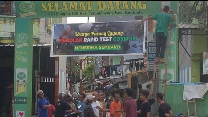 Spanduk pennolakan pelaksanaan rapid tes milik warga Kelurahan Layang Kecamatan Bontoala Kota Makassar (dokpri)
