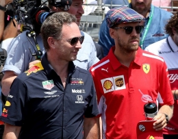 Christian Horner dan Sebastian Vettel (sumber: essentiallysports.com)