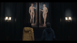 Martha Nielsen (diperankan oleh Lisa Vicari) dan Jonas Kahnwald (Louis Hoffman) tengah berdiri dan menatap lukisan Adam-Eve | sumber: IMDB/Netflix