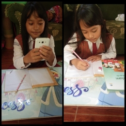 AFIKA HILWA EL-GIANI, siswa kelas 3 SD sedang mengerjakan tugas sekolah via Smart phone. Dok. pribadi.