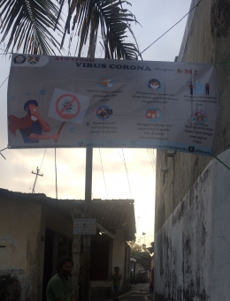 Banner yang sudah terpasang pada jalan yang sering dilalui masyarakat RT 03 Kelurahan Rejowinangun Selatan