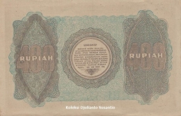 Bagian belakang uang ORI Rp 400 berisi undang-undang untuk pemalsu uang (Dokpri)