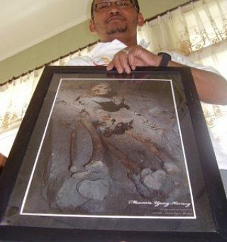 Foto kerangka manusia prasejarah Gayo yang dipajang dalam sebuah pameran foto di Takengon. Foto. Koleksi pribadi