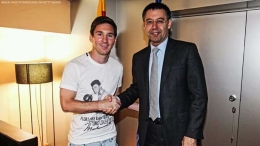 Messi dan Bartomeu berjabat tangan, Sumber : Barcelona Indonesia, Facebook. 