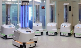 Robot UVD yang membantu proses strelisasi ruangan pasien Covid-19 (www.theguardian.com)