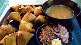 Tuslob Buwa, makanan khas Cebu Filipina yang menggunakan ketupat. - Sumber: y101fm