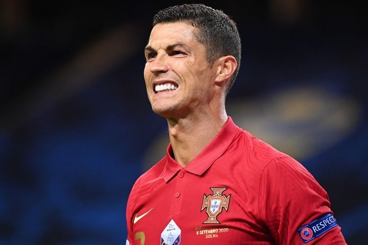 Cristiano Ronaldo positif terpapar Covid-19.| Sumber: AFP/Jonathan Nackstrand via Kompas.com