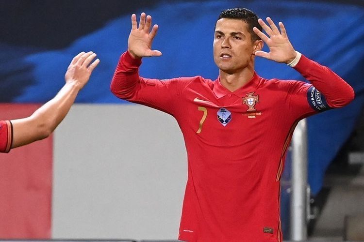 Penyerang Portugal, Cristiano Ronaldo, merayakan gol keduanya ke gawang Swedia di ajang UEFA Nations League pada 8 September 2020 di Solna, Swedia, Rabu (9/9/2020) dini hari WIB.(AFP/JONATHAN NACKSTRAND) via Kompas.com