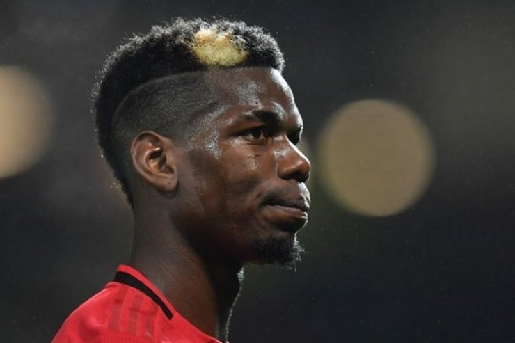 Gelandang Manchester United (Man United) Paul Pogba. (AFP / PAUL ELLIS) via kompas.com
