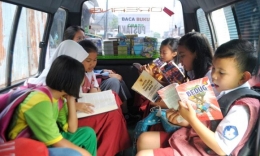 Anak membaca (Ilustrasi: jawapos.com)