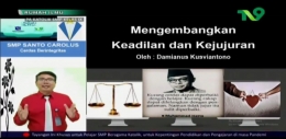 Damianus Kusviantono, S.Pd., M.Pd. (Guru SMP Santo Carolus Tarakanita Surabaya) saat PJJ di TV9.|Tangkapan layar dokpri