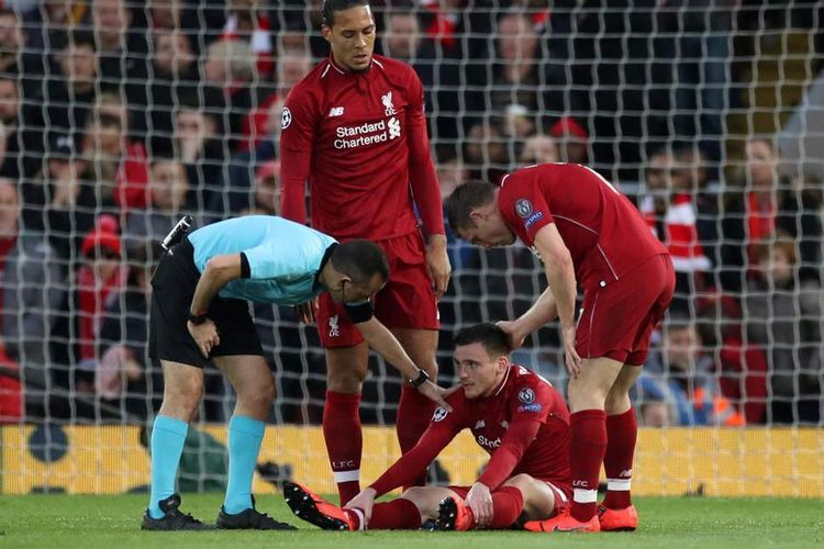 ilustrasi: Bek sayap Liverpool, Andy Robertson, pernah juga mengalami cedera saat bertanding melawan Barcelona di ajang Liga Champions, Rabu (8/5/2019) dini hari WIB. (sumber: Reuters via kompas.com)