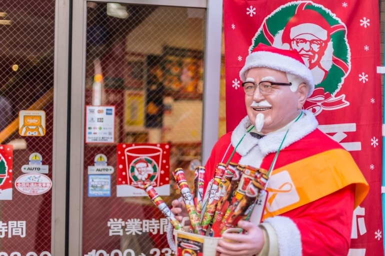 A festive Colonel Sanders greets customers at KFC in Japan | Quality Stock Arts/Shutterstock 