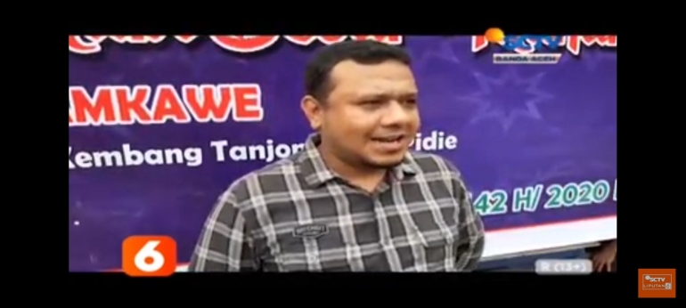 Sekdes Gampong Lamkawe saat di wawancarai televisi nasional. Foto: Screenshot Siaran SCTV. facebook.com/fico.asyarief