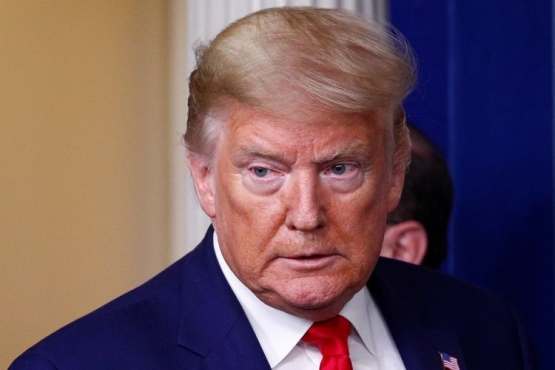 Donald Trump, salah satu kepala negara yang pernah tertular Covid-19 (Reuters/Tom Brenner)