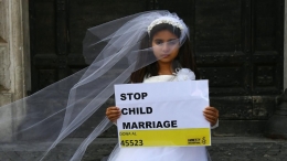 Ilustrasi kampanye anti pernikahan dini. (GABRIEL BOUYS/gettyimages.com via thetimes.co.uk)