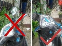Belokkan stang ke kanan saat memarkirkan motor untuk menyulitkan pencuri. | Tribunnews.com