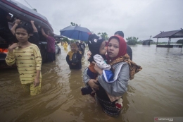 Banjir bandang di Kalimatan Selatan (foto: Antara).