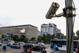 Ilustrasi pemasangan kamera pengawas dan pemberlakuan tilang elektronik (sebelumnya) di Jakarta. Gambar: Maulana Mahardika via Kompas.com