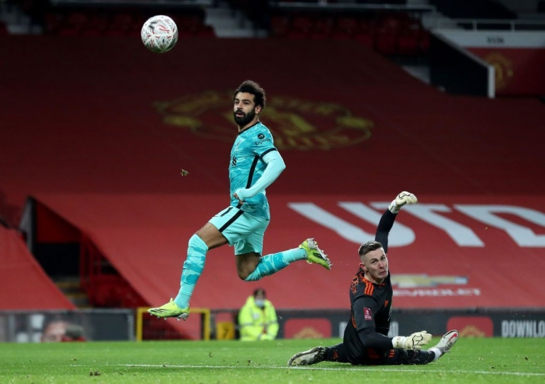 Salah mencetak gol pertama yang indah (Foto: Getty Images/Laurence Griffiths)