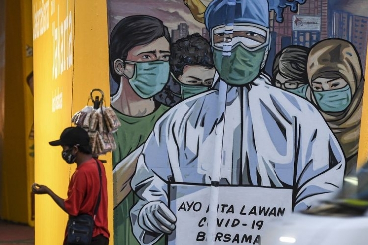 ilustrasi tetap berdagang di masa pandemi covid-19. (sumber: ANTARA FOTO/M RISYAL HIDAYAT via kompas.com)