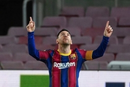 Gaya khas Messi ketika merayakan gol (Foto: AFP/ Lluis Gene) 