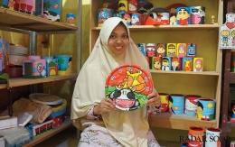 Siti Restamti, Daur Ulang Kaleng Bekas Jadi Ladang Bisnis Kreatif. Sumber gambar: Radar Solo