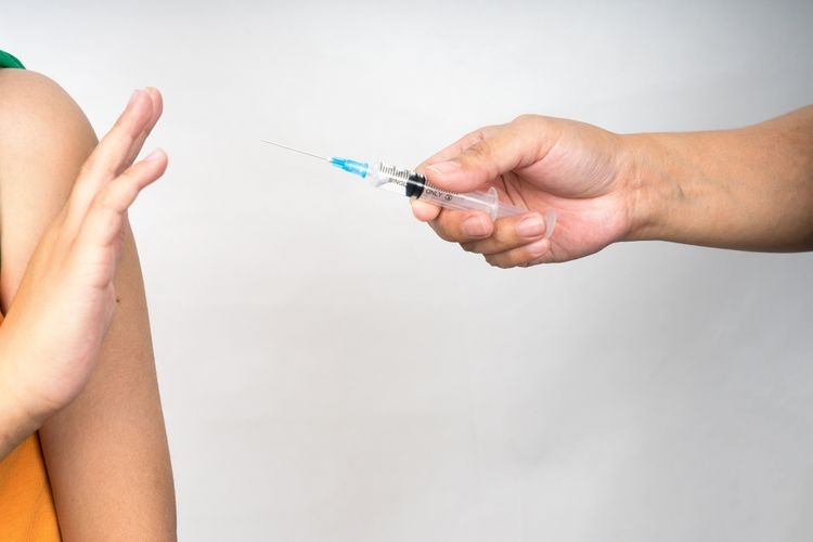 Ilustrasi anti vaksin, tak percaya vaksin.(SHUTTERSTOCK/Jasni via KOMPAS.com)