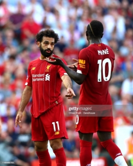 Mohammad Salah dan Sadio Mane yang menunaikan kewajiban sebagai pesepakbola profesional selagi menjalani ibadah puasa (Chloe Knott-Danehouse/Getty Images)