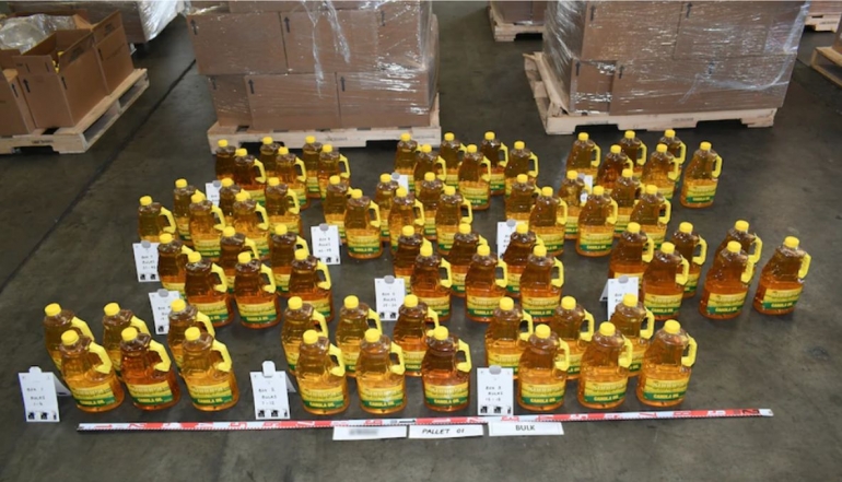 Diantara minyak goreng yang dikirim ke Australia ada 269 botol yang dicampur dengan ekstasi cair. Photo: AFP.