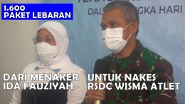 Menaker Ida Fauziyah menyalurkan bantuan paket Lebaran kepada 1.600 tenaga kesehatan di Rumah Sakit Darurat Covid Wisma Atlet Kemayoran, Jakarta Pusat, pada peringatan Hari Buruh Internasional, Sabtu (01-05-2021). Foto: isson khairul